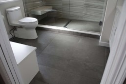 grey and white toned bathroom creates a crisp modern feel